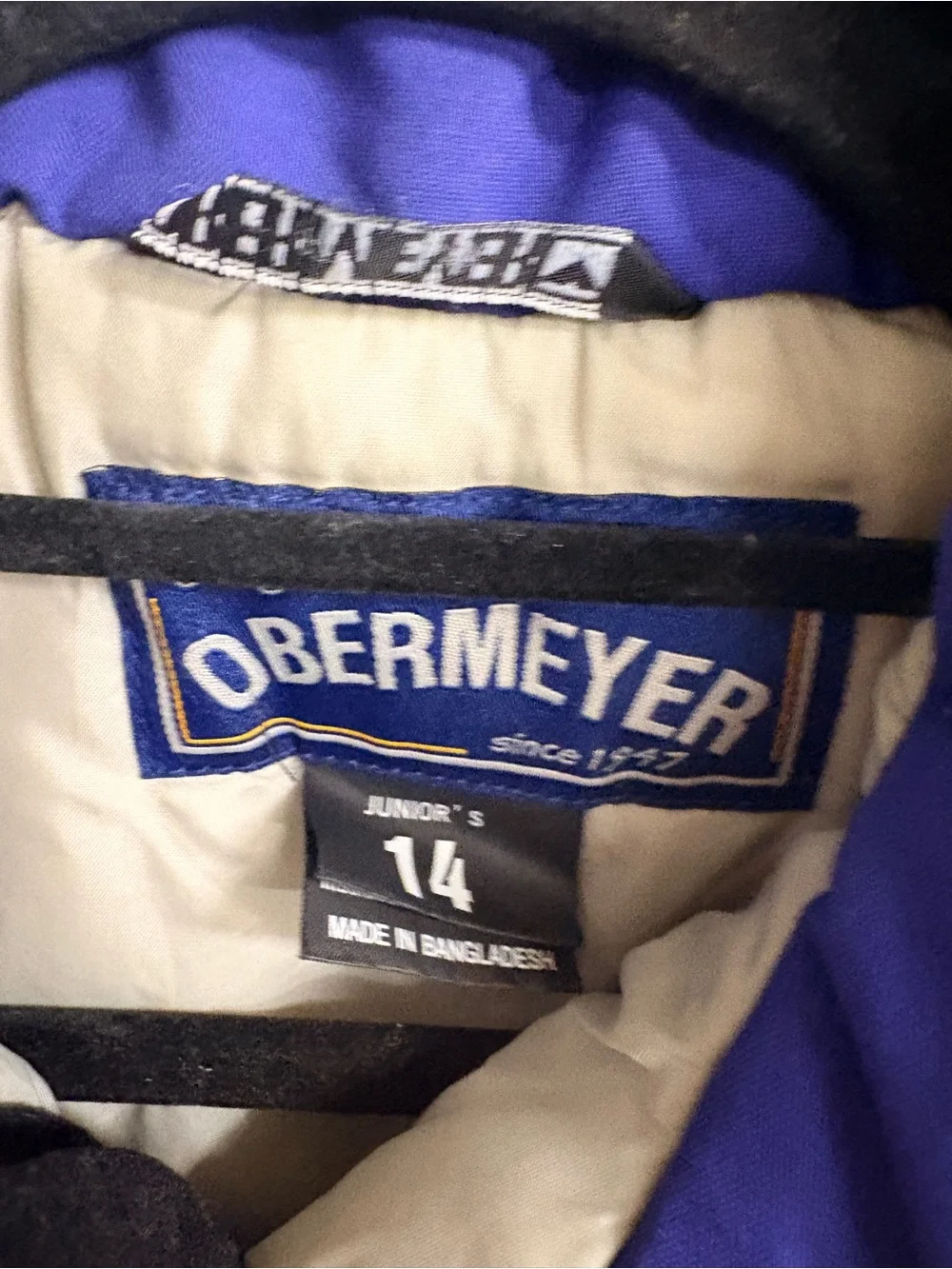 Obermeyer Orange and Cream Performance Jacket with Blue Trim